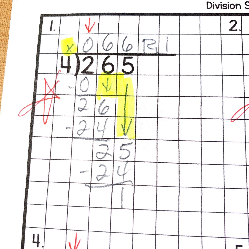 image of a graded long division problem on graph paper